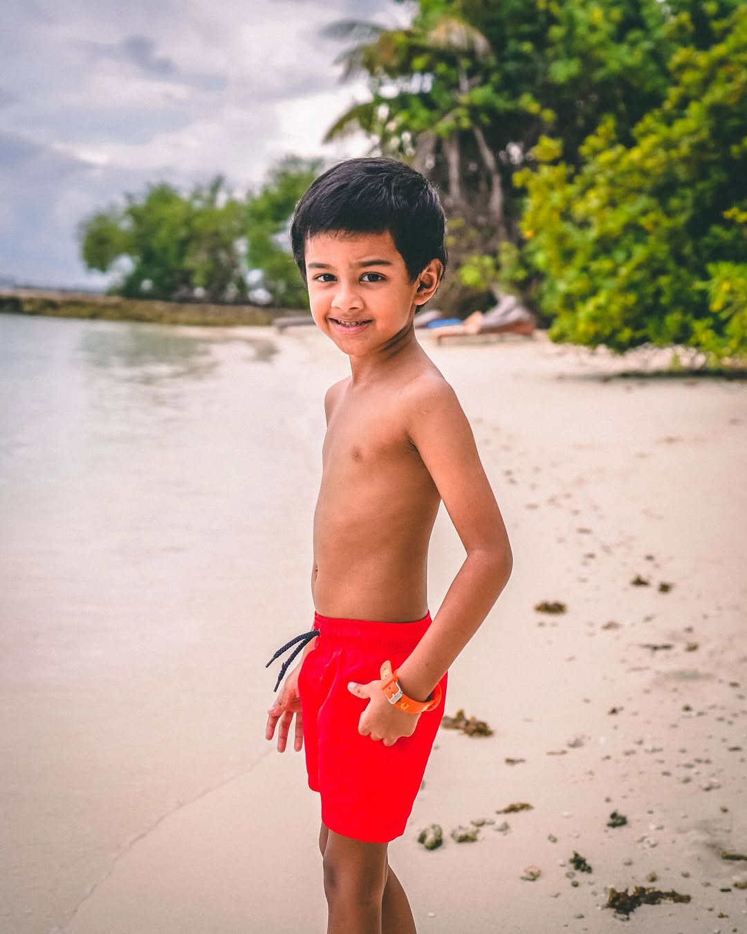 Beach in red shorts
